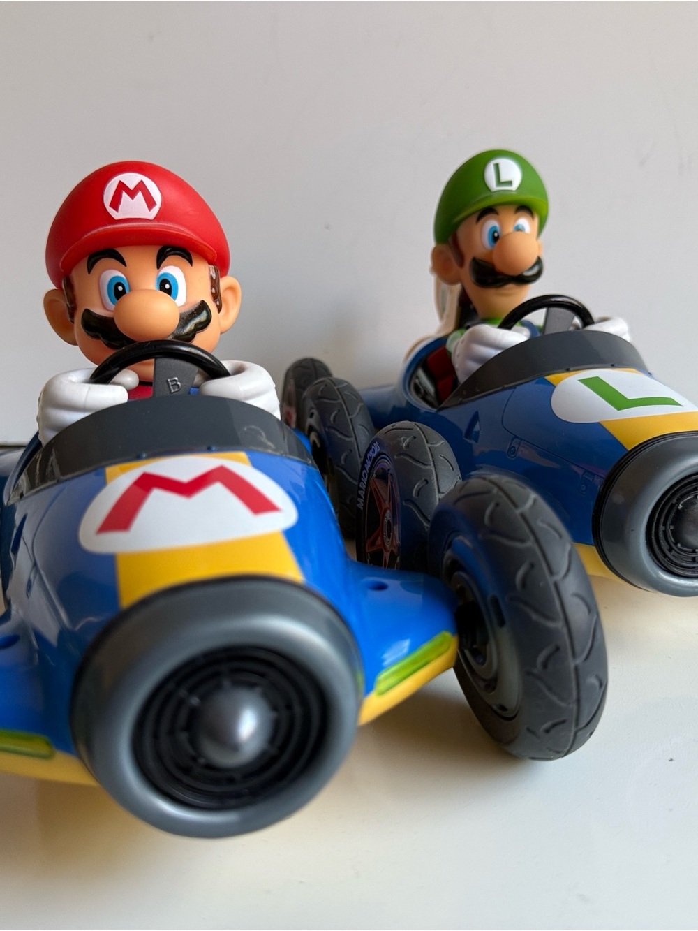 Nintendo Mario & Luigi Blue Race Cars with Red and Green Helmets